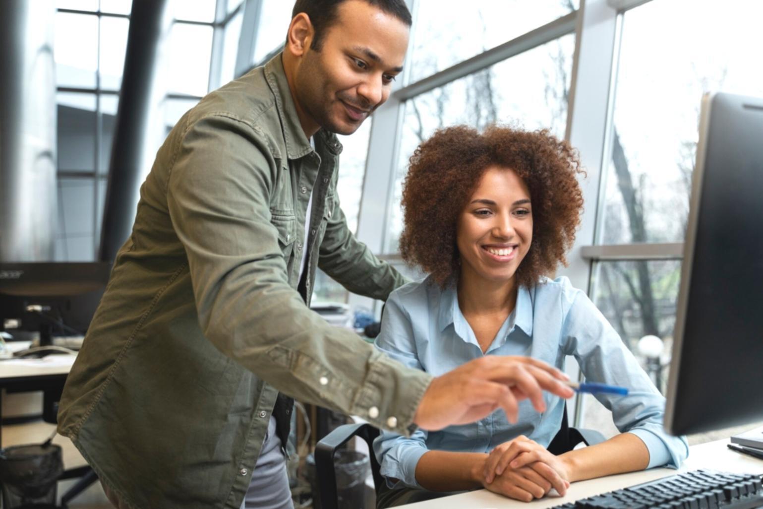 Business planning session showing financial documents and strategy discussions